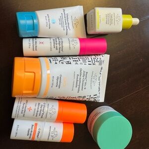Drunk Elephant Skincare Collection - Orange, Pink, Blue Accents
